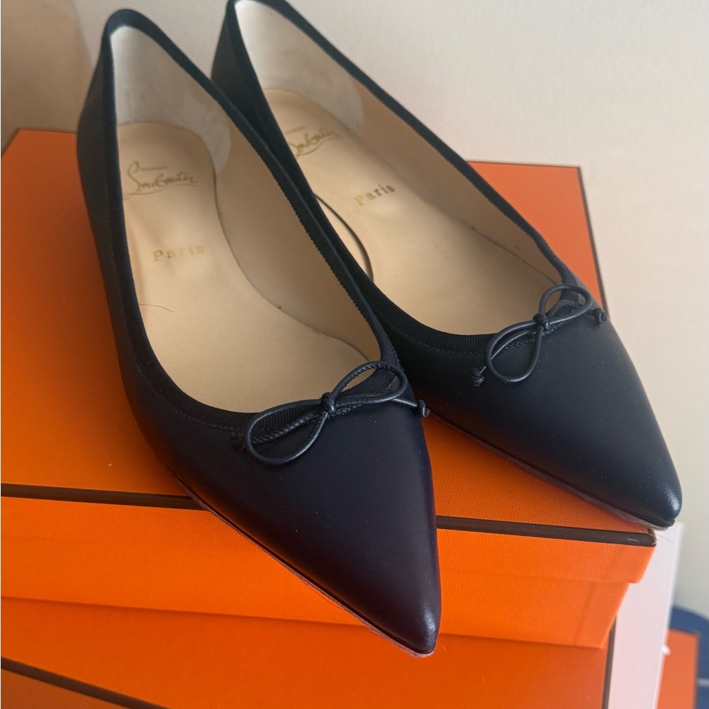 Authentic preloved Christian Louboutin pointy flats. Red soles w/ protector.